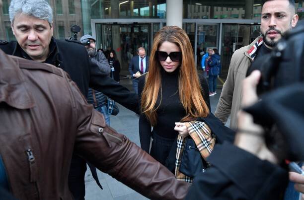 Colombian singer Shakira (C) leaves the court in Barcelona on December 1, 2022, after she has attended the ratification of the separation demand with his ex husband and the agreement on the custody of their children. (Photo by Pau BARRENA / AFP) (Photo by PAU BARRENA/AFP via Getty Images)