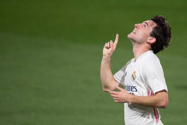 Real Madrid's Spanish defender Alvaro Odriozola celebrates after scoring a goal during the Spanish League football match between Cadiz and Real Madrid at the Ramon de Carranza stadium in Cadiz on April 21, 2021. (Photo by JORGE GUERRERO / AFP) (Photo by JORGE GUERRERO/AFP via Getty Images)