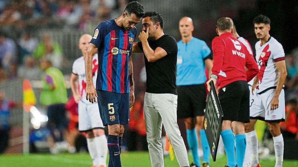 Busquets y Xavi